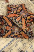 THREE ANTIQUE PERSIAN CARPET PANELS MOUNTED AS CUSHIONS