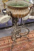 AN ANTIQUE WROUGHT IRON AND COPPER JARDINIERE