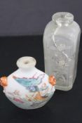 TWO CHINESE SNUFF BOTTLES, ONE OF SQUARE FORM WITH INTERNAL FLORAL AND LANDSCAPE DECORATION, THE