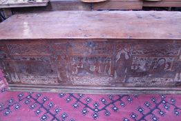 AN EARLY CONTINENTAL CEDAR PLANK CASSON WITH SHALLOW CARVED AND PENWORK DECORATED FRIEZE