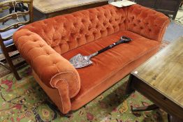 A VICTORIAN BUTTON BACK CHESTERFIELD SETTEE