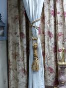 A pair of lined cotton ticking drapes with tie backs and a pair of floral lace drapes with tie backs