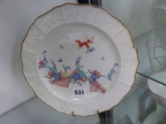 An unusual Derby plate decorated with Oriental style squirrels and foliage. Moulded basket weave