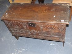 A 17th.c.elm plank coffer with carved decoration dated 1662