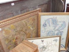 A gilt framed Arts and Crafts style needlework panel and two others