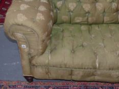 A Victorian deep seated button back Chesterfield sofa