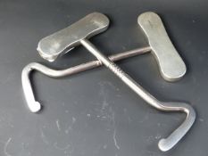 A pair of vintage hallmarked silver handled boot hooks