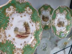Six Davenport landscape decorated cabinet plates with pierced green and gilt borders