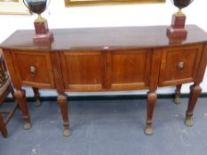 An unusual colonial teak early 19th.c.bow front sideboard