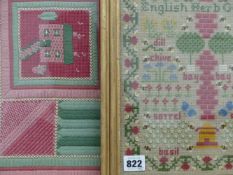 A needlework sampler, the English Herb Garden and a folk art sample stitch panel