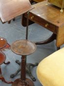 A Victorian Carter's patent adjustable reading stand together with a turned carved mahogany lamp