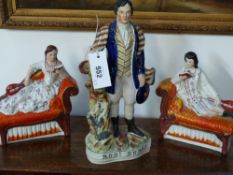 A pair of Staffordshire pottery figures of reclining musicians and another of Robert Burns