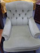 A late Victorian deep seat armchair