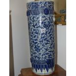 A Chinese blue and white umbrella/stick stand, flower heads and scrolling foliage