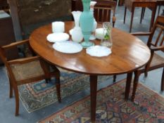 A French provincial oval dining table