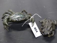 A Japanese bronze figure of a crab and a toad, the crab with shell lid