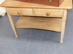 An antique continental pine two drawer side table