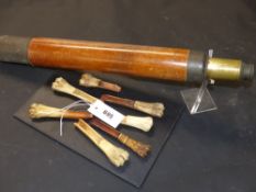 Seven Antique bone apple corers. Together with a single draw mahogany brass bound telescope
