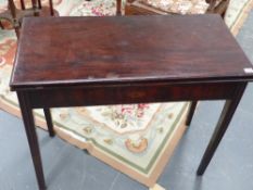 An 18th.c.mahogany and inlaid fold over tea table