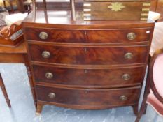 An early 19th.c.mahogany and inlaid bow front chest of four long graduated drawers