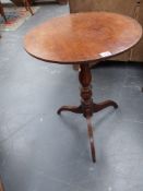 A late Georgian oak tilt top tripod table