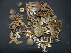 A COLLECTION OF BRASS SHOULDER TITLES TO INCLUDE -OX & BUCKS T4(4), WELSH T7 (2), KINGS, WELSH,