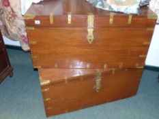 Two large brass bound teak campaign trunks