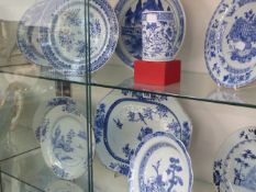 A collection of Chinese blue and white export wares to include an octagonal platter, twelve