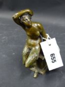 An Antique Italiante bronze of a seated female satyr