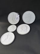 Five biscuit plaques decorated with classical figures in relief to include three Royal Copenhagen