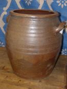 A large stoneware pottery flour barrel