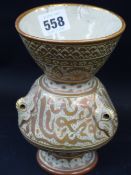 An Antique Continental pottery baluster vase with lustre eastern style decoration