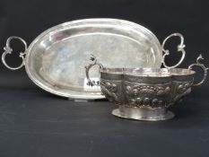 Two Antique Continental pieces, a small oval twin handle tray and a lobed form twin handle footed
