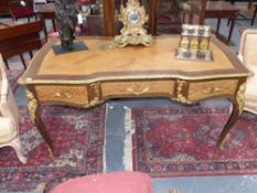 A Louis XV style gilt bronze mounted and inlaid writing desk