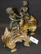 A pair of French ormolu and patinated bronze Louis XV style chenets