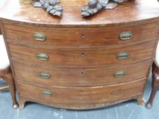 A Regency mahogany and crossbanded bow front chest of four graduated drawers