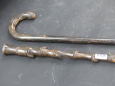 A 19th.c.sectional form walking cane together with a horn handled walking stick