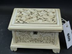 A well carved Cantonese ivory casket the top with writhing dragons, the sides decorated with