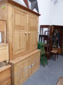 A large Victorian pine housekeeper's cabinet