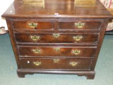 An early 18th.C. oak chest of three long and two short drawers