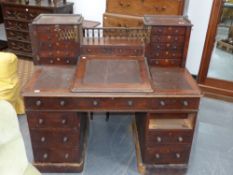 A Victorian walnut Dickens desk