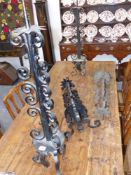 Four antique wrought iron pricket candlesticks