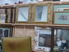 A pair of gilt framed mirrors and two others