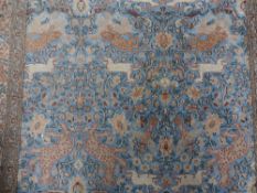 A Persian hunt pattern rug