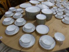 An extensive Italian dinner service by Richard Ginori.. to include serving pieces, tea wares, etc.