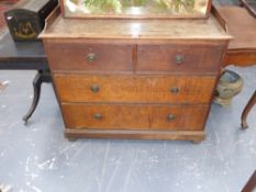 A Victorian oak chest of two short and two long drawers with gallery top