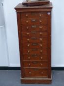A Victorian pine side locking Wellington chest of ten drawers