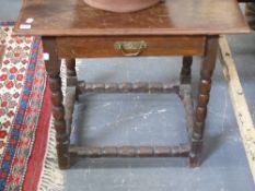 An 18th.C. and later oak side table with bobbin turned legs