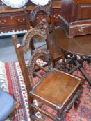 A set of four 18th.C. Oak peg jointed back stools