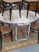 An 18th century limed oak gateleg table